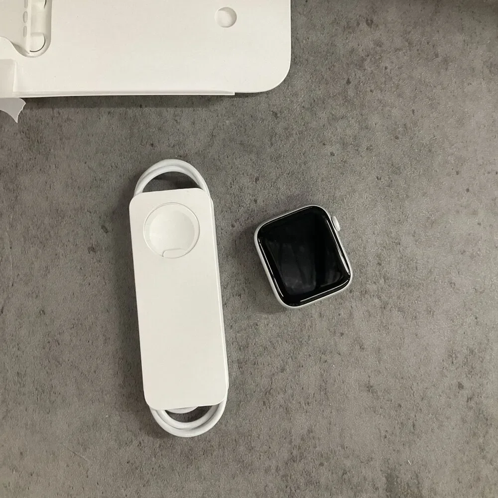 Apple Watch SE 44mm Silver Aluminum Case White Cellular Sport Band MYDQ2LL/A